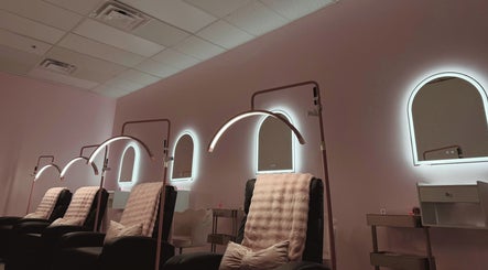Luxurious treatment chairs at The Lash Boutique in Tukwila, Washington, US, under soft lighting.