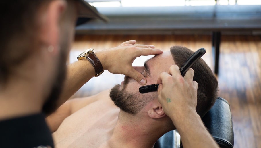 Grooming session at Motown Granby, Granby, Quebec, CA, showcasing precise beard trimming.