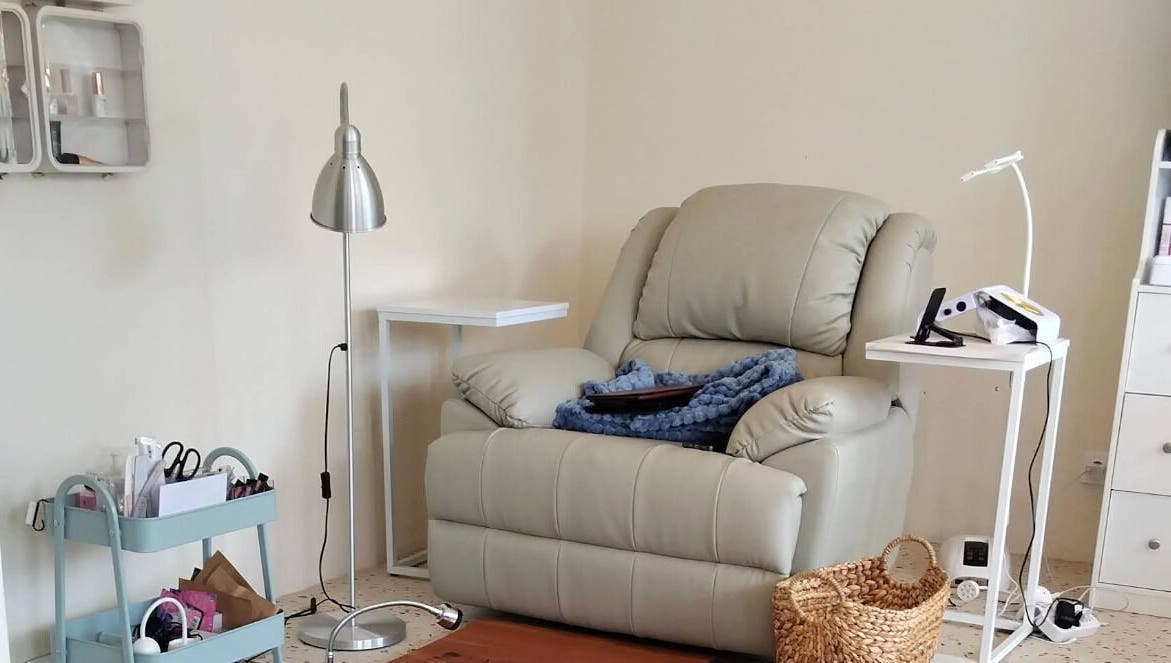 Relaxing corner at Suka Kuku, featuring a comfy chair and wellness setup in Bali, Bali, ID.