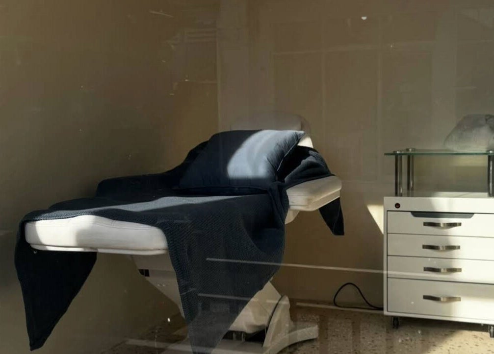 Luxurious spa treatment room at Suka Kuku, Bali, Bali, ID featuring a cozy treatment bed.