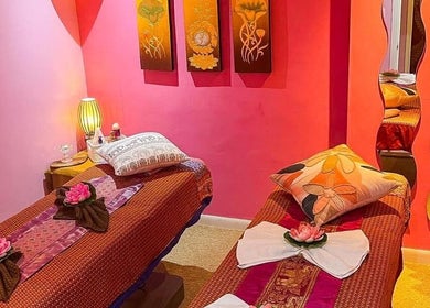 Relaxing massage room at Bua Siri Thai Massage, Bournemouth, England, GB, featuring soothing decor and ambient lighting.