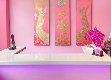 Bua Siri Thai Massage reception with elegant pink decor in Bournemouth, England, GB.