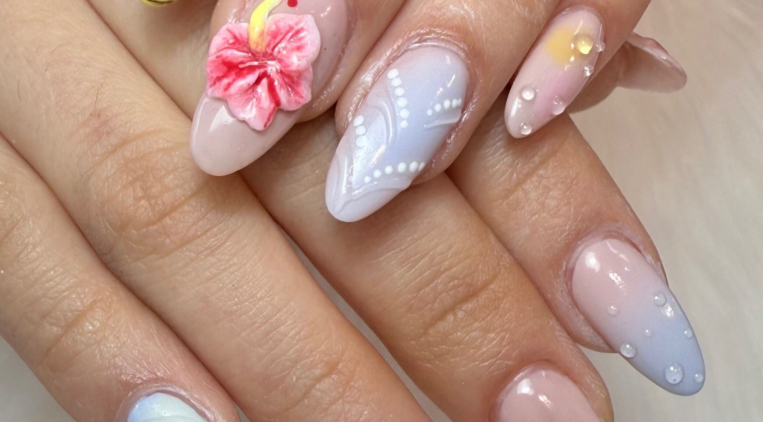 Intricate floral nail art design at Lotus Leaf Beauty Salon, Melbourne, Victoria, AU.