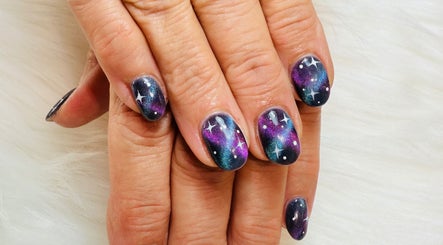 Galaxy-themed nail art at Lotus Leaf Beauty Salon, Melbourne, Victoria, AU.