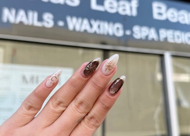 Stylish nail art at Lotus Leaf Beauty Salon, Melbourne, Victoria, AU, showcasing elegant designs.