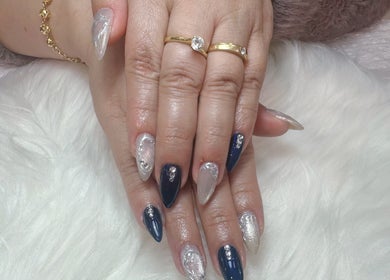 Elegant nail art at Lotus Leaf Beauty Salon in Melbourne, Victoria, AU showcasing intricate designs.