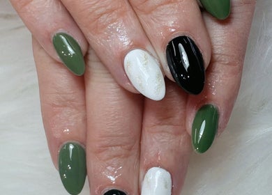 Stylish green, white, and black manicure at Lotus Leaf Beauty Salon, Melbourne, Victoria, AU.