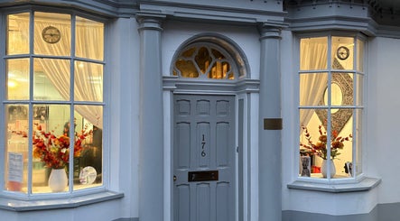 Elegant exterior of Emma Victoria Hair salon in Stourbridge, England, GB, with welcoming decor.