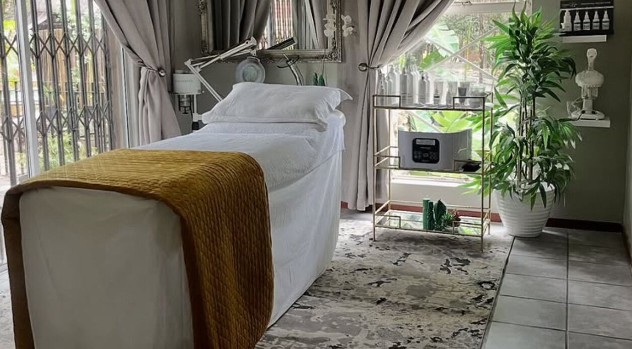 Luxurious treatment room at Rifumo Boutique Spa, Mbombela, Mpumalanga, ZA, with a cozy massage bed.