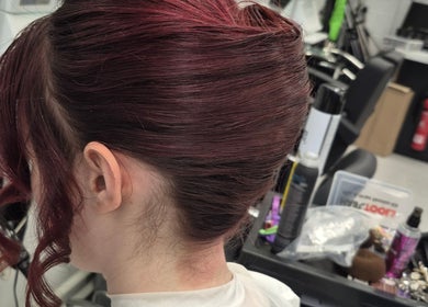 Stylish brunette updo at Ooh Hair, County Louth, County Louth, IE salon, showcasing professional hairstyling.