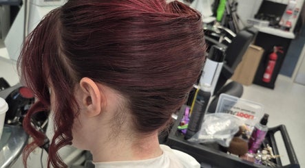 Stylish brunette updo at Ooh Hair, County Louth, County Louth, IE salon, showcasing professional hairstyling.