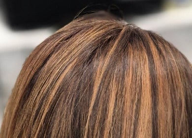 Highlighted brunette hair expertly styled at Ooh Hair, County Louth, County Louth, IE.