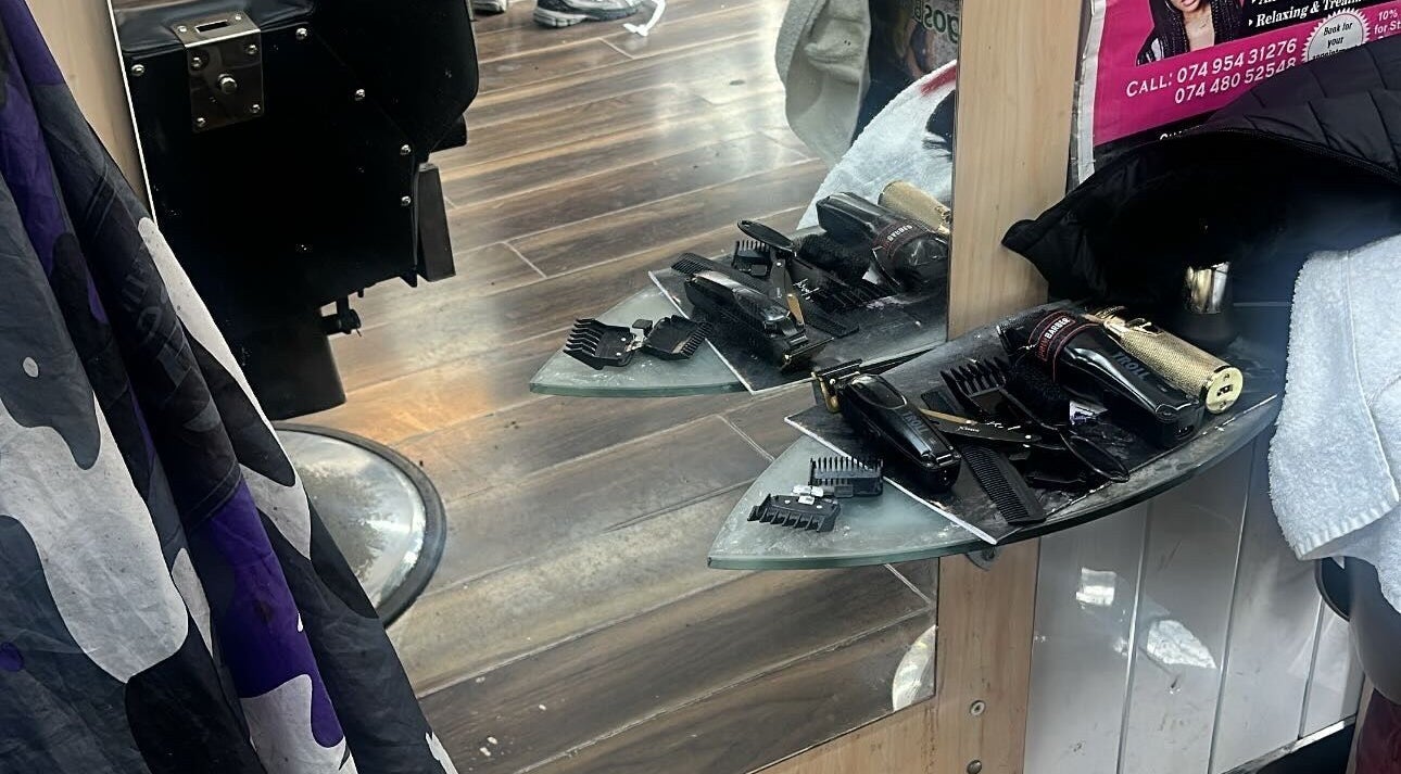 Professional barber tools at K.Klippz, Manchester, England, GB, reflecting style and precision.