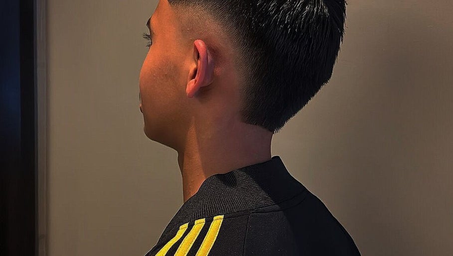 Side view of a fresh fade haircut at Bilscutz, Singapore, SG, showcasing expert styling.