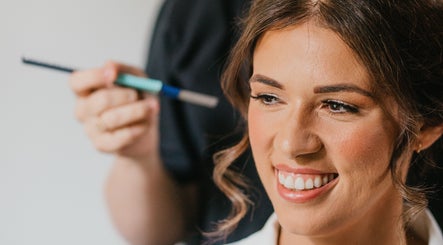 Woman enjoying hair styling at The Healing Head Spa by Amiee Lauren Hairdressing, Leighton Buzzard, England.