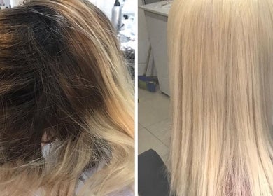 Glamourhair salon in London, England, GB showcases a dramatic hair makeover from dark roots to silky blonde.