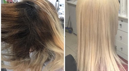 Glamourhair salon in London, England, GB showcases a dramatic hair makeover from dark roots to silky blonde.