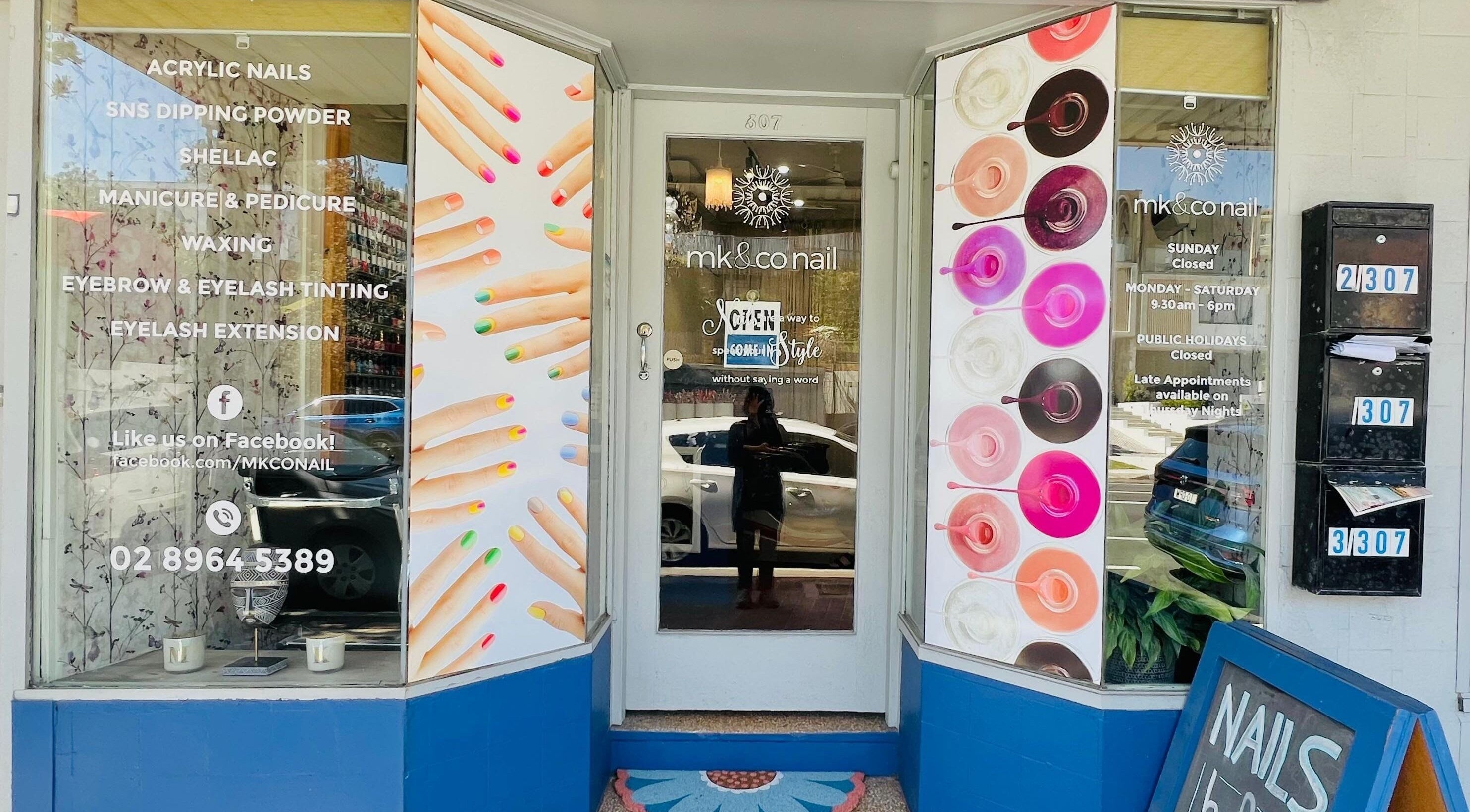 Entrance of Mk & Co Nail in Maroubra, New South Wales, AU with colorful nail art displays.
