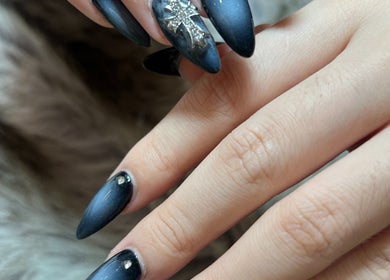 Elegant black nail art with silver accents by Mk & Co Nail in Maroubra, New South Wales, AU.