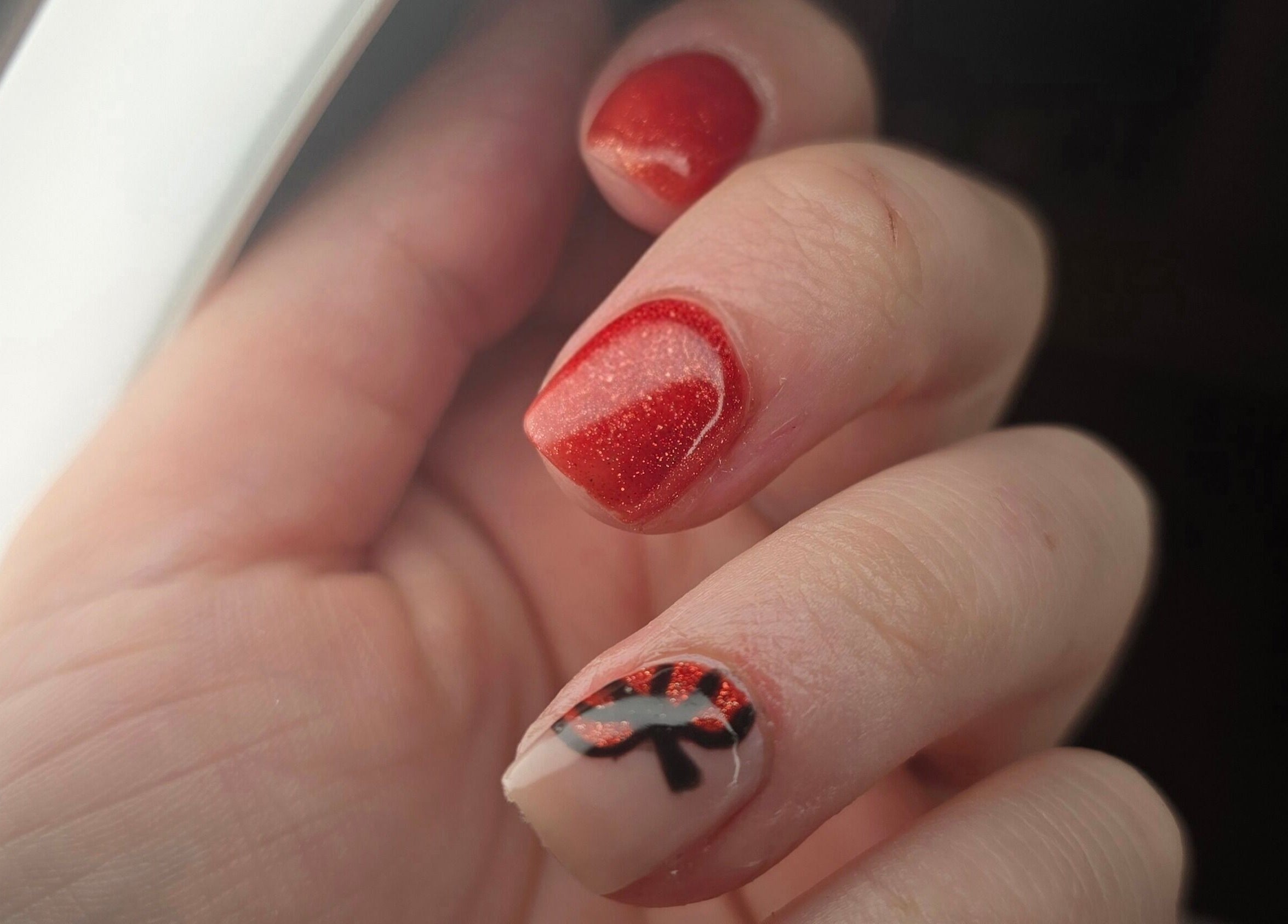 Stunning red nail art at Amy's Nailed It, Neyland, Wales, GB, showcasing intricate design and expert care.