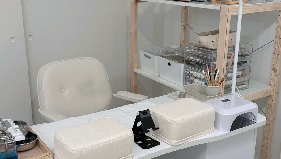 Manicure station at Palette Carys UK in London, England, GB, featuring nail care tools and supplies.