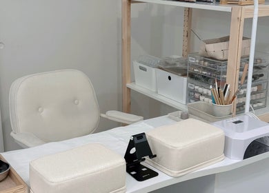 Manicure station at Palette Carys UK in London, England, GB, featuring nail care tools and supplies.