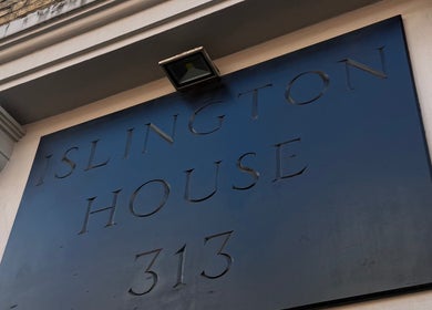 Front view of Islington House signage at Palette Carys UK, London, England, GB.