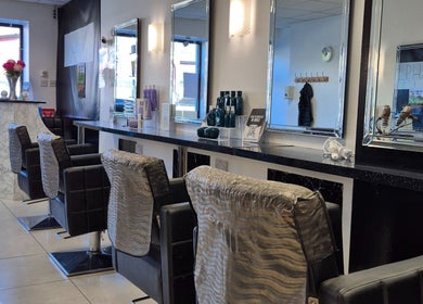 Elegant salon chairs and mirrors at Stephanie O'Keeffe Hair in Cork, County Cork, IE.