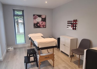 Tranquil massage room at Reflexology by Laura in Newbridge, County Kildare, IE featuring soothing decor.