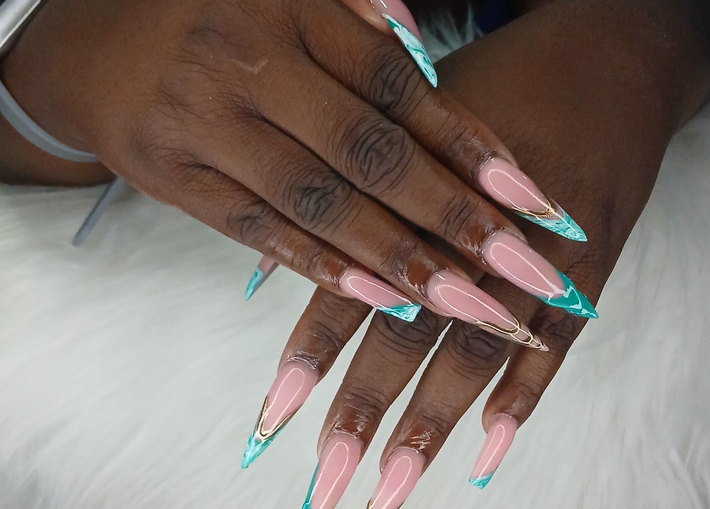Intricate aqua and gold nail design at Zee's Beauty Studio, Porey Spring, Saint Thomas, BB.