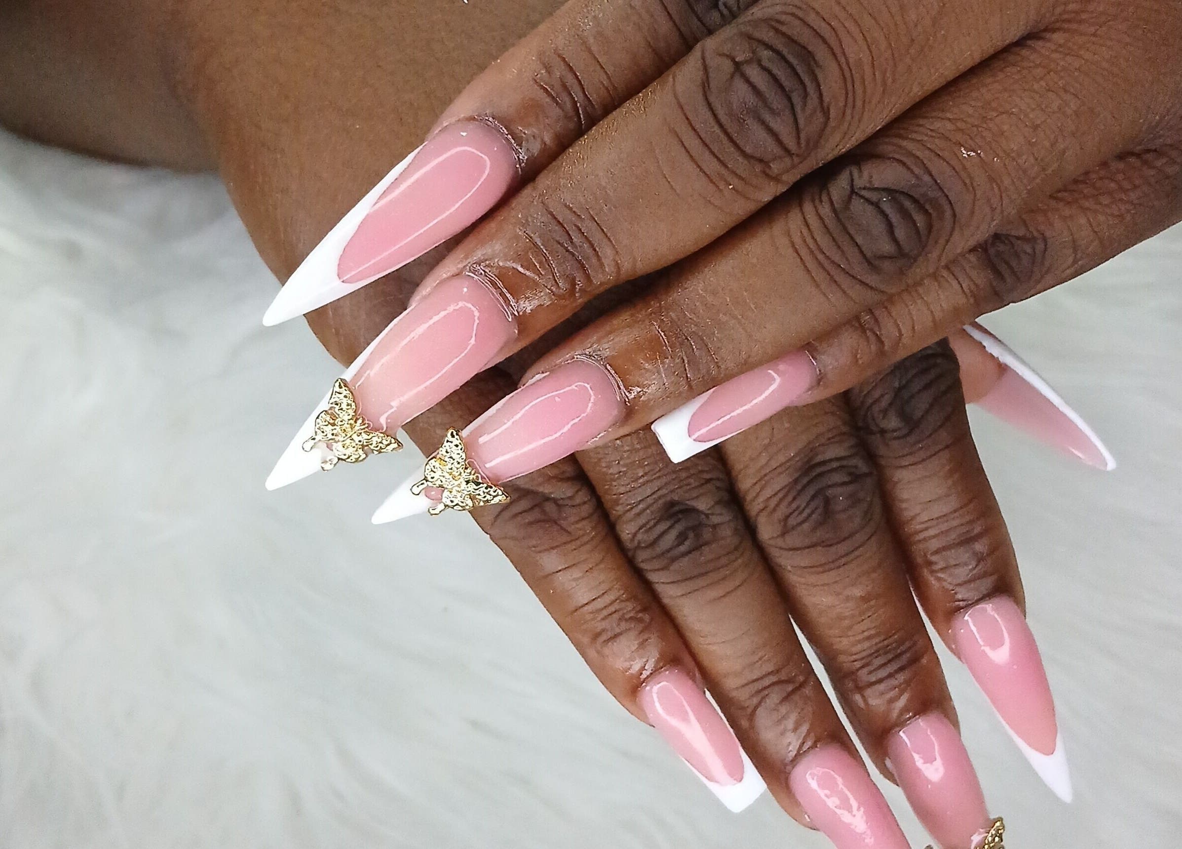 Elegant pink and white French manicure at Zee's Beauty Studio, Porey Spring, Saint Thomas, BB.