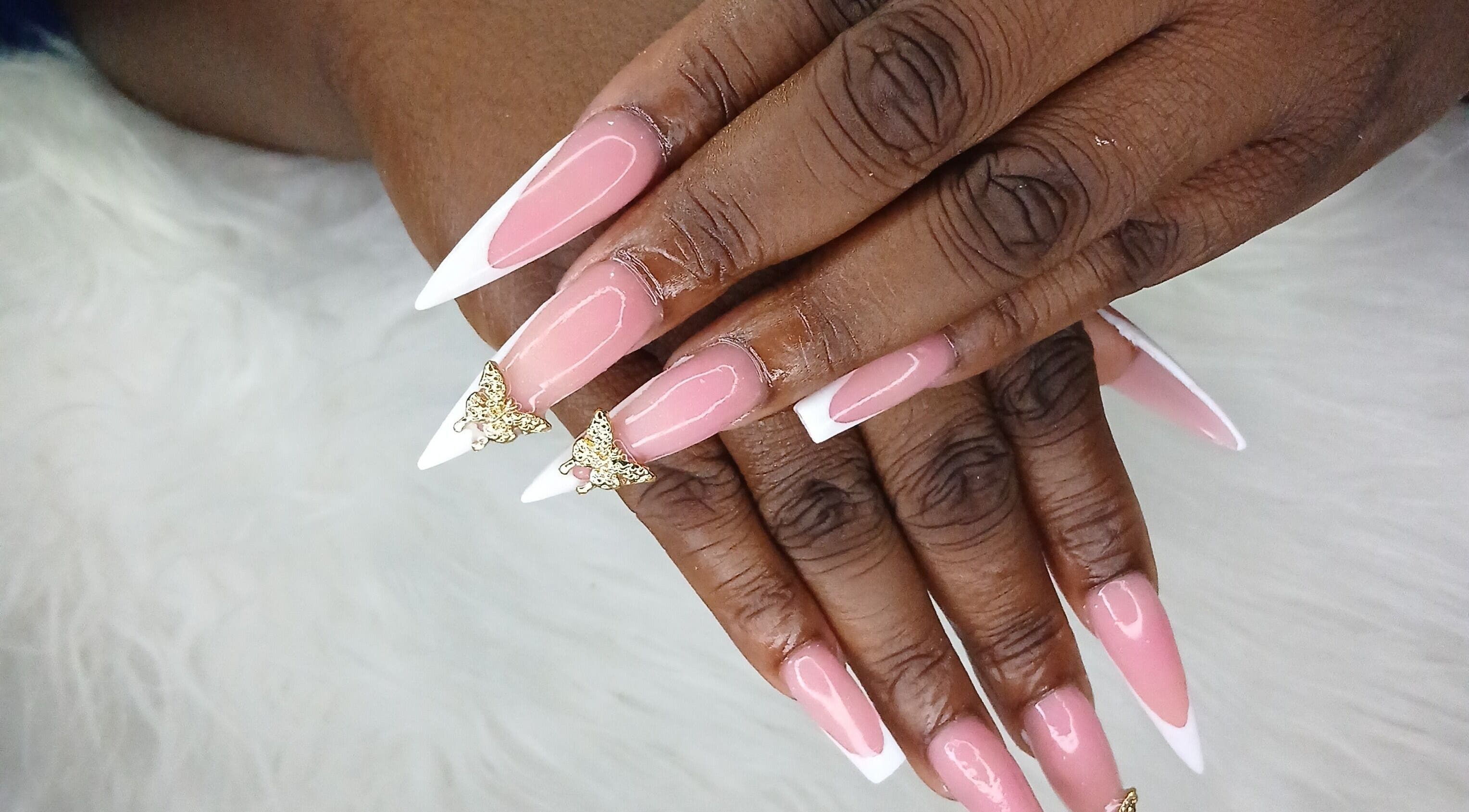 Elegant pink and white French manicure at Zee's Beauty Studio, Porey Spring, Saint Thomas, BB.