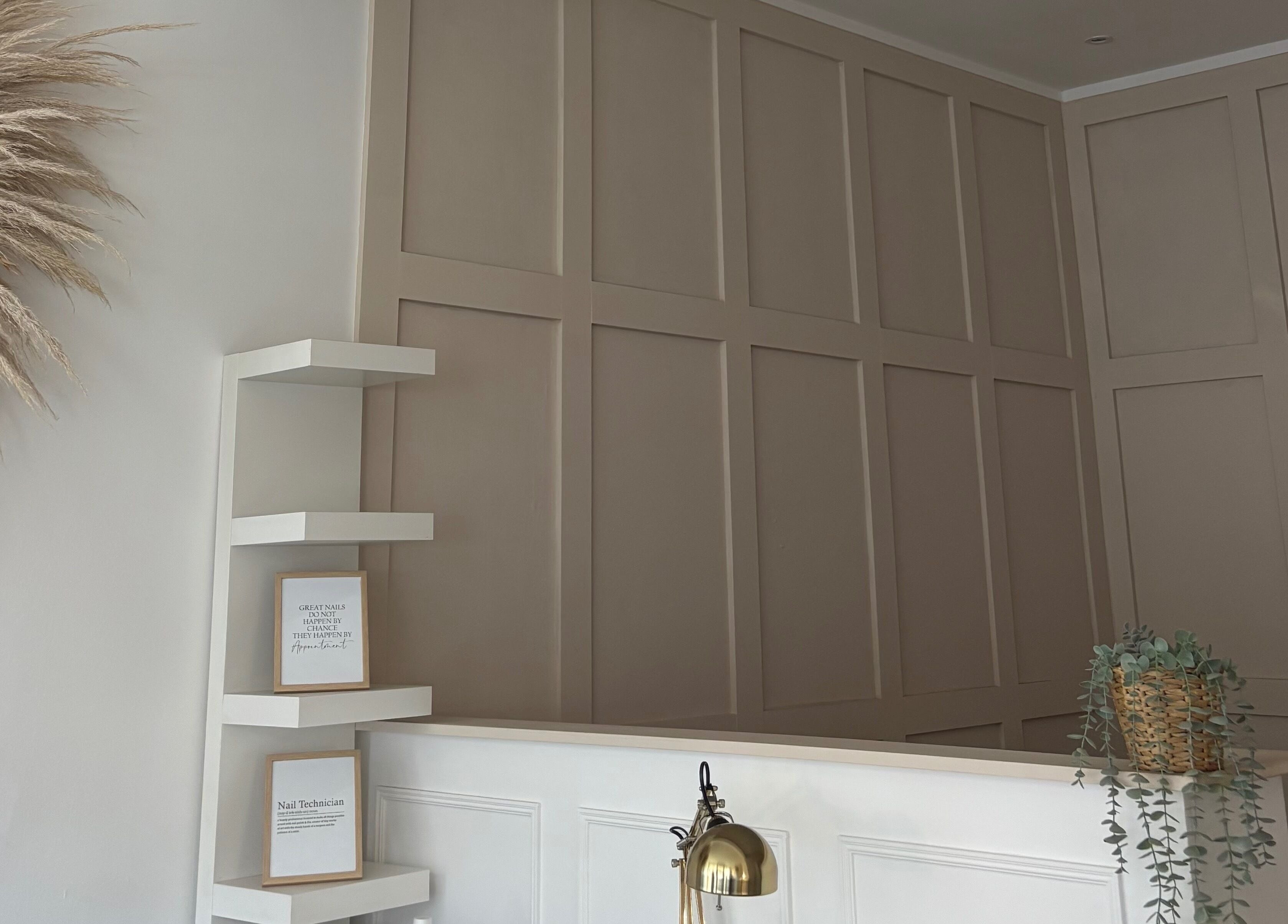 Elegant reception with pampas decor and shelving at KB Beauty Room, Senghenydd, Wales, GB.