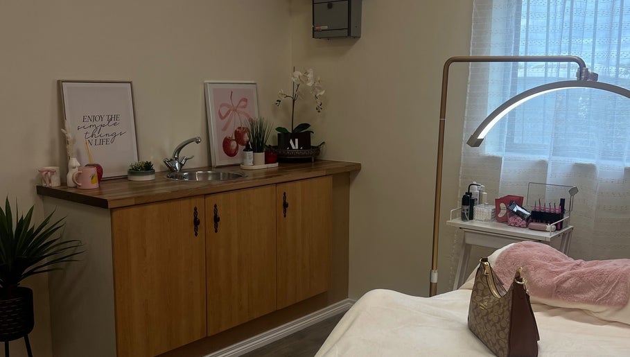 Cozy interior of Eves Lash Studio in Portadown, Northern Ireland, GB featuring a stylish sink and decor.