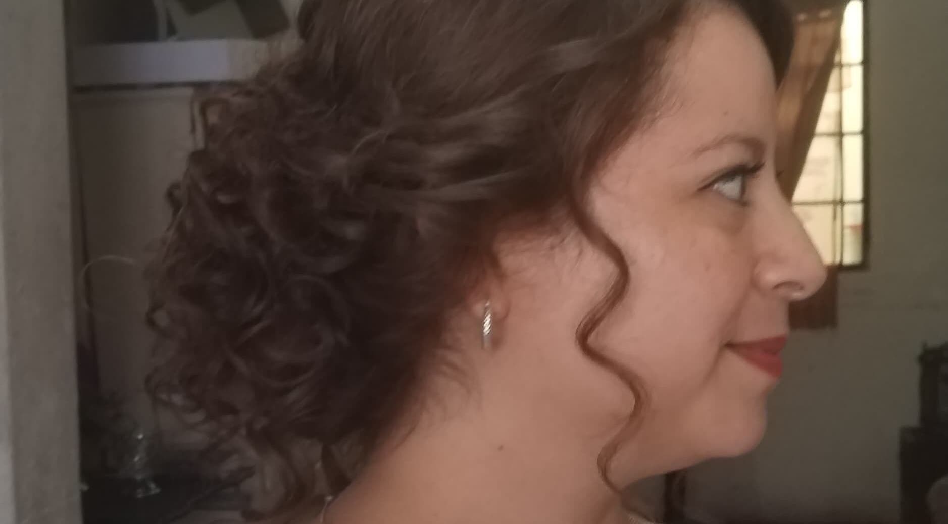 Elegant curly hairstyle at Belly's Makeup & Hair, Ciudad De Guatemala, Guatemala, GT.