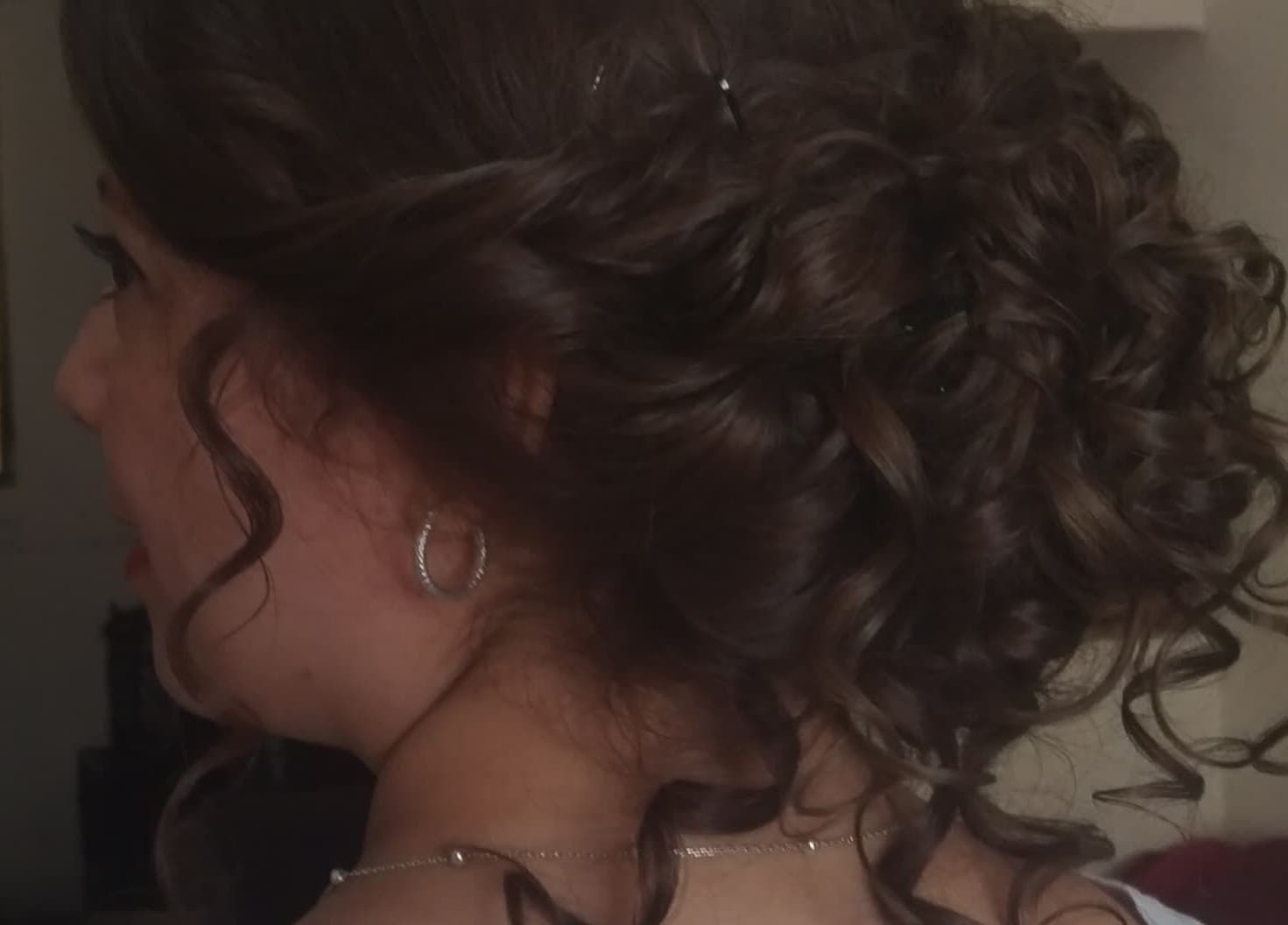 Elegant curly updo hairstyle at Belly's Makeup & Hair, Ciudad De Guatemala, Guatemala, GT.