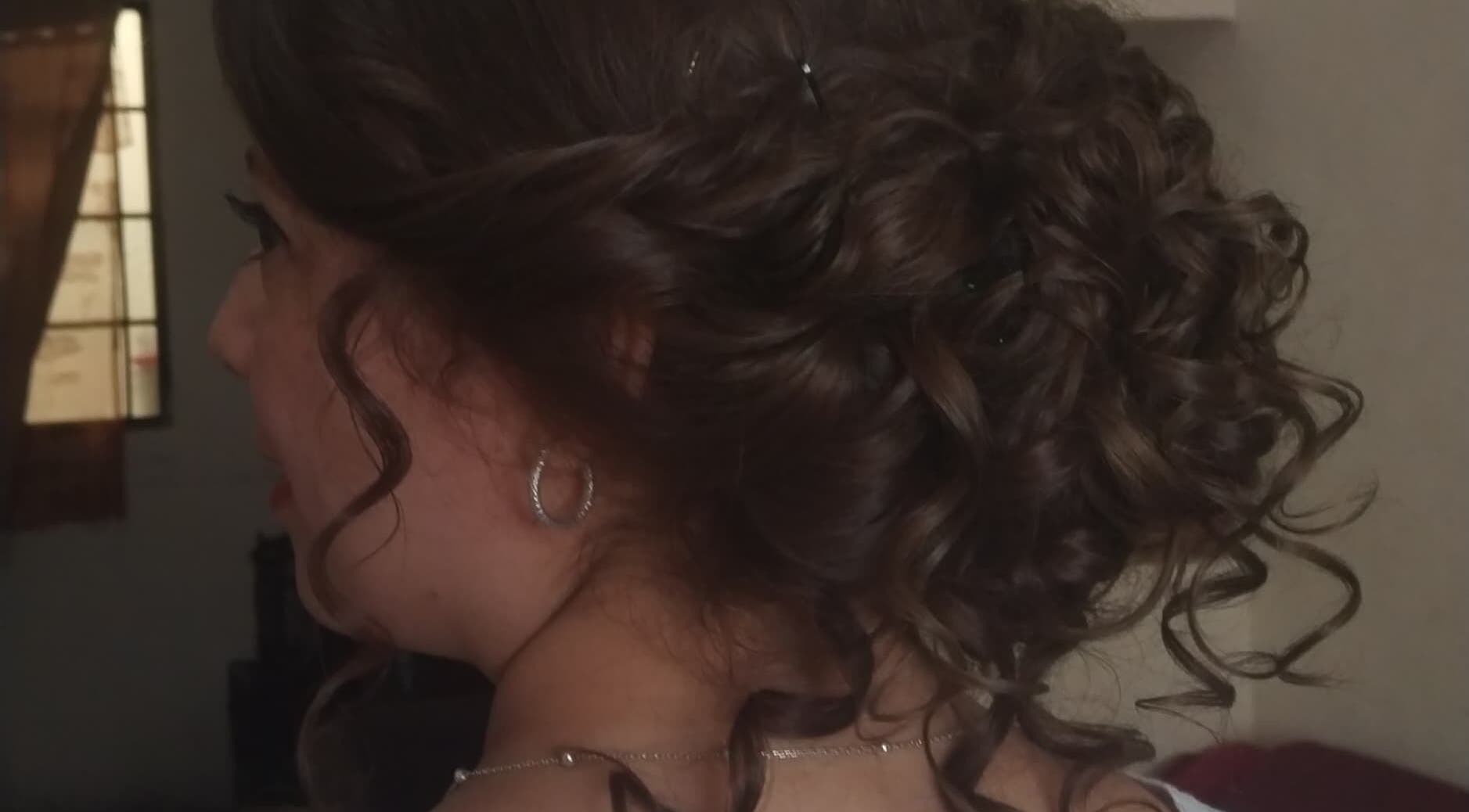 Elegant curly updo hairstyle at Belly's Makeup & Hair, Ciudad De Guatemala, Guatemala, GT.