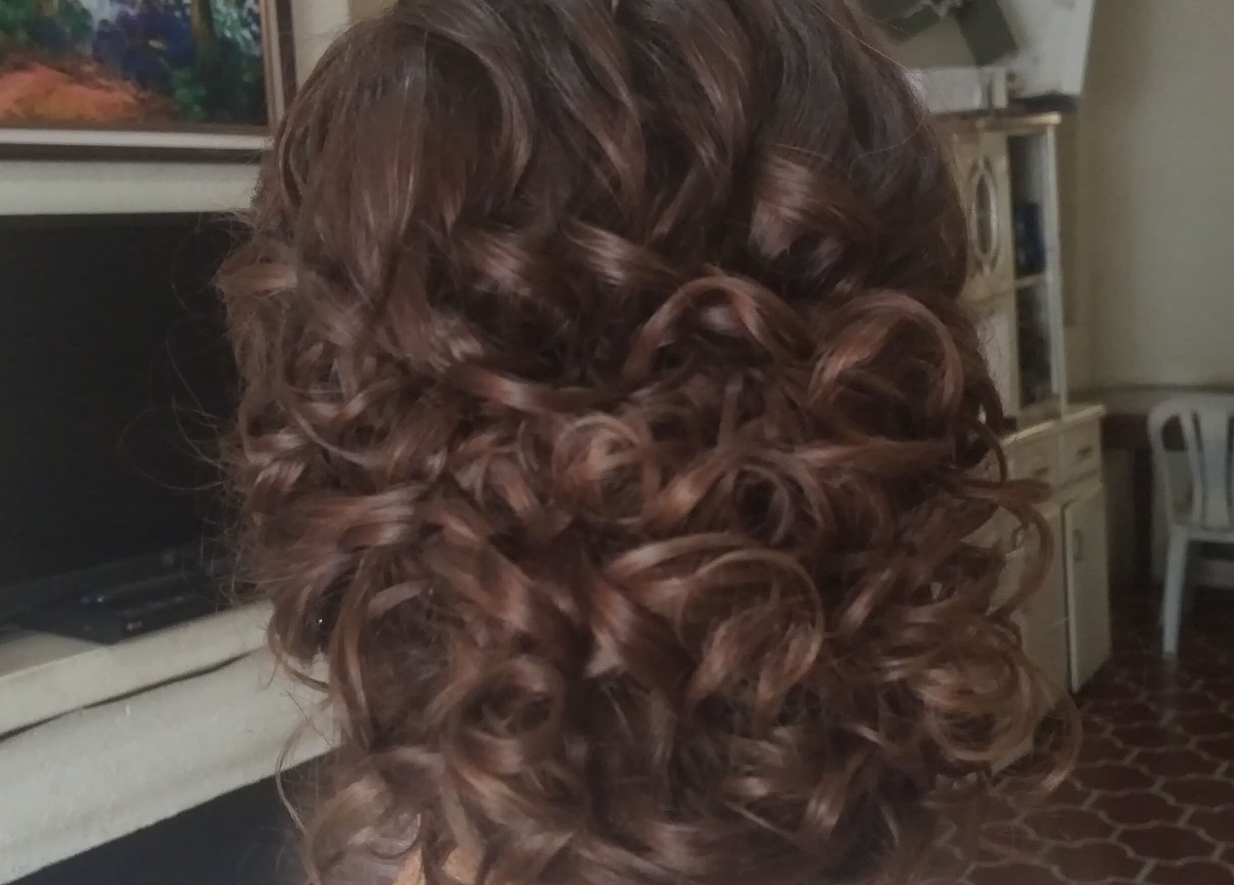 Intricate curly hairstyle at Belly's Makeup & Hair, Ciudad De Guatemala, Guatemala, GT.
