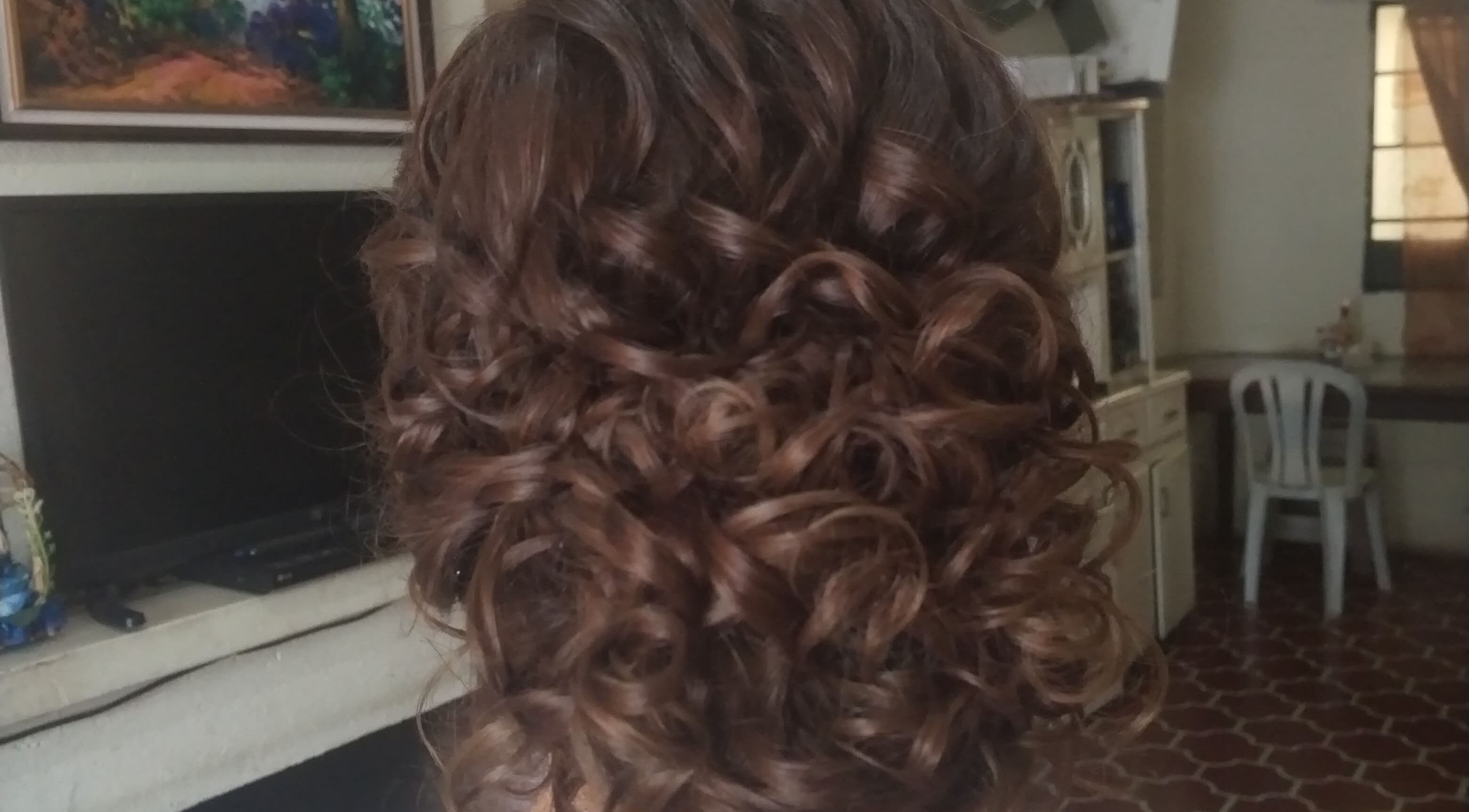 Intricate curly hairstyle at Belly's Makeup & Hair, Ciudad De Guatemala, Guatemala, GT.