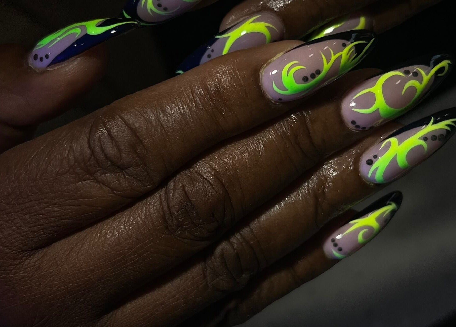 Close-up of artistic neon nail design at ChristianShS, Stockport, England, GB.