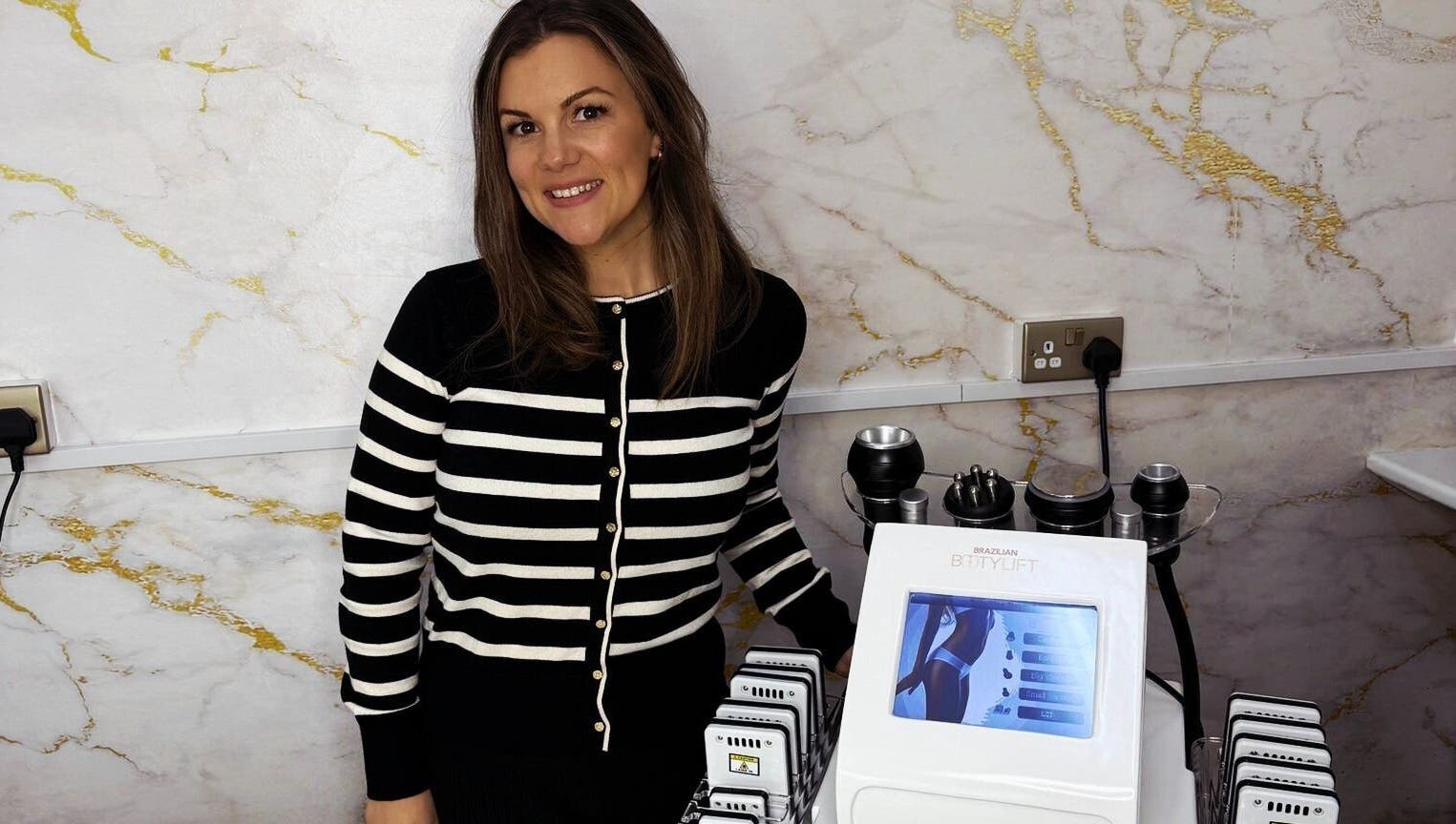 Beyond Contour in Yeadon, England, showcasing a wellness expert beside advanced beauty equipment.