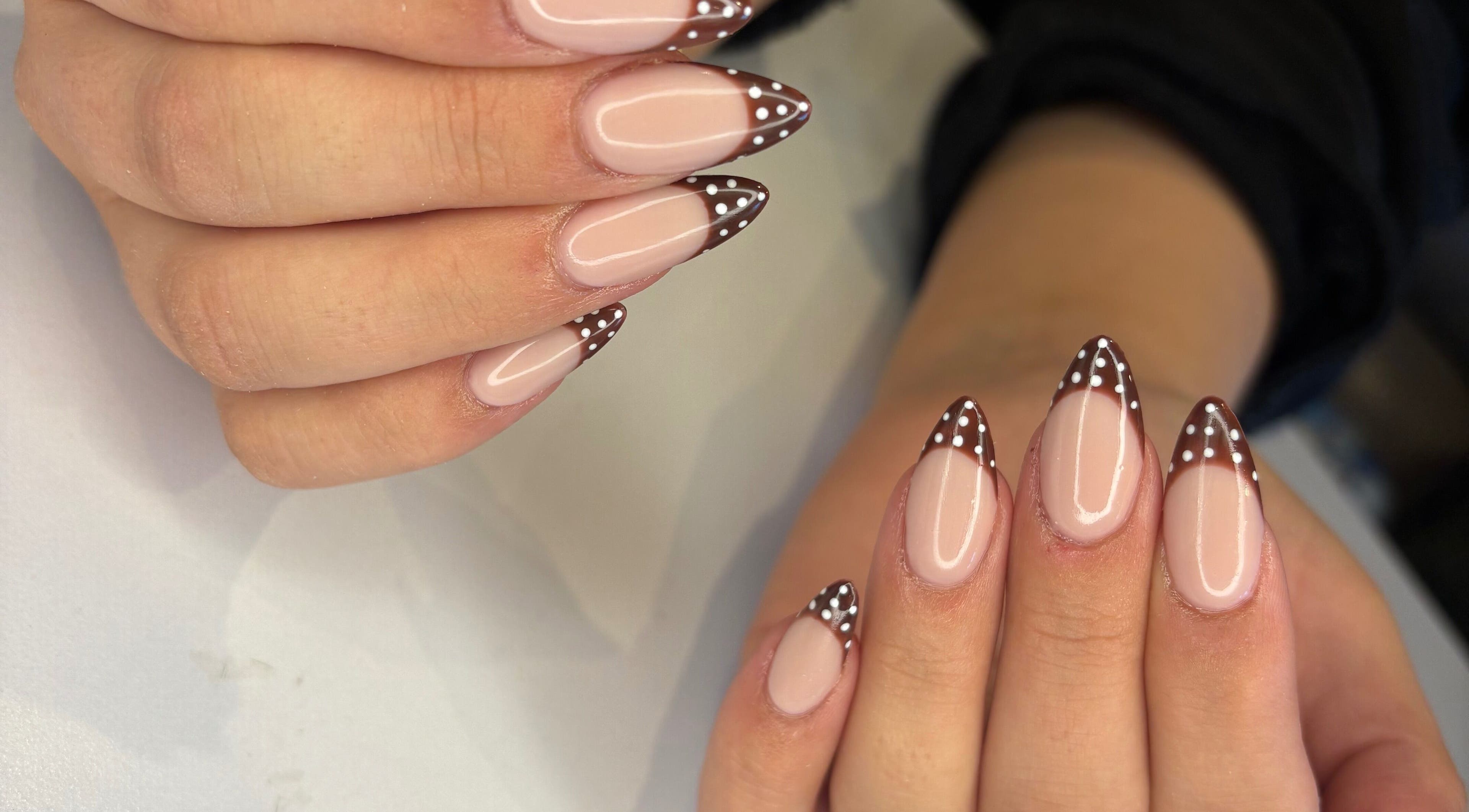 Elegant polka dot nail art at Dolluxe Beauty, Aberdeen, Scotland, GB.