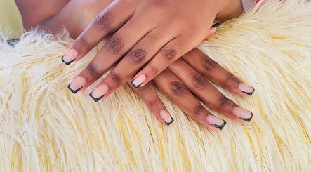 Stylish nails with black tips from Kay's Beauty & Nails, Vosloorus, Gauteng, ZA.
