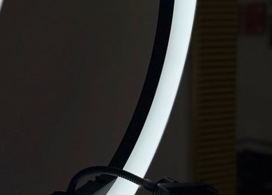 Elegant lighting setup at Inguna Chaman Hair Design, Rīga, LV, creating a serene salon ambiance.