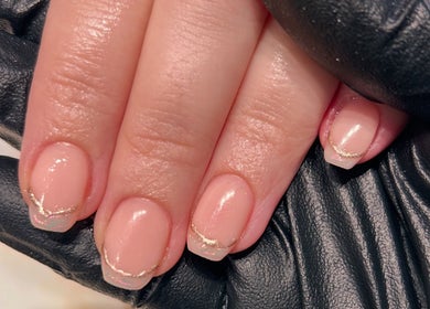 Nail art by Lisa Marie Manicurist at The Mani Muse Nails in Brentwood, England, GB, showcasing chic glossy design.
