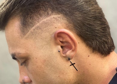 Close-up of a sleek sidecut by Haircut by Ronii_moo in Bali, Bali, ID, showcasing intricate design.
