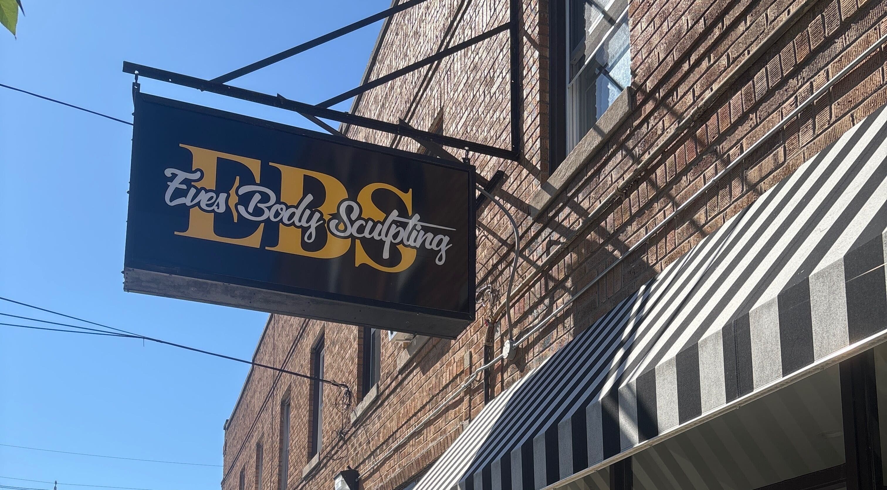 Sign of Eves Body Sculpting, Garfield, New Jersey, US, showcasing wellness center's location.