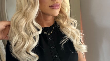 Blonde waves styled at Bybethanyhairco in Shrewsbury, England, GB showcasing expert craftsmanship.