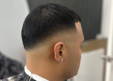 Close-up of a sharp fade haircut at Stylzzbycliff_thebarber in Kingston, St. Andrew Parish, JM.