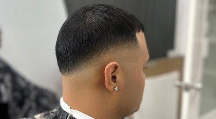 Close-up of a sharp fade haircut at Stylzzbycliff_thebarber in Kingston, St. Andrew Parish, JM.